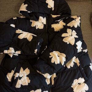 Black and white floral puffer coat